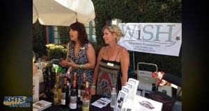 Hart district spokeswoman Gail Pinsker, left, and WiSH Foundation executive director Amy Daniels,, volunteer at a fundraising event for the Hart district
