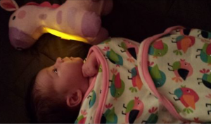 A Coroner's official identified the body of a 3-week-old baby found Saturday morning, officials said Sunday.