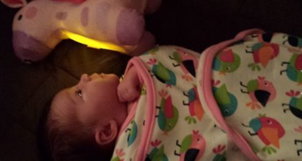 A Coroner's official identified the body of a 3-week-old baby found Saturday morning, officials said Sunday.