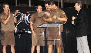UPS driver Pete White receives  his special uniform shirts with the 25 years of safe driving shoulder patch. Photo by Michele E. Buttelman.