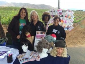 Members from the Santa Clarita Valley Relay for Life team stand by their booth at the festival.