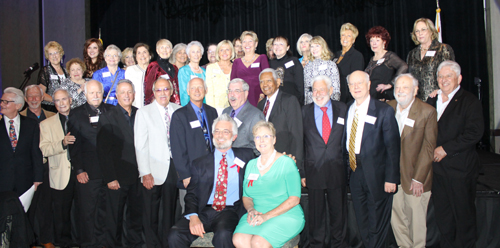 Leon Worden and Sue Endress pose with former SCV Man and Woman of the Year honorees. Photo by Michele E. Buttelman.