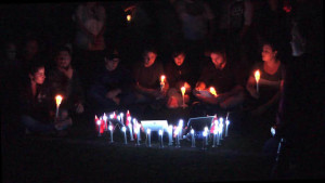 Dozens gather for a candelight vigil on Wednesday.