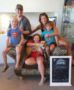 Crimson with her new family. Photo courtesy of Shelter Hope via Facebook.