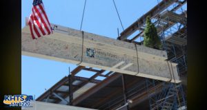 The final beam is hoisted to the top of the new patient tower at Henry Mayo Newhall Hospital.