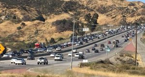 Coroner IDs Man Killed By Errant Tire On Highway 14