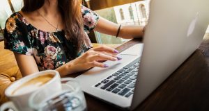 Woman on Apple Laptop