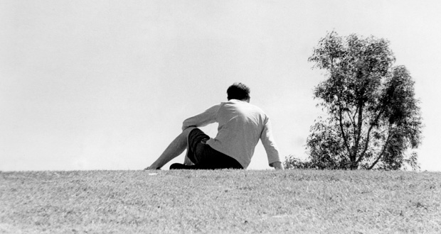Man alone on a hill