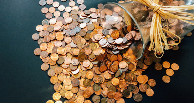 Coins spilled out on table