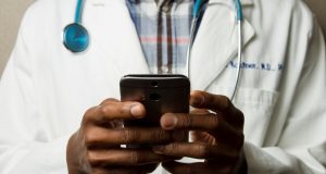 Image of Doctor with cell phone