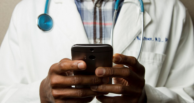 Image of Doctor with cell phone