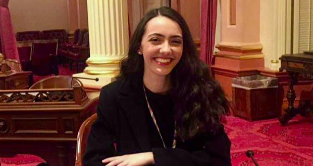 Julia Runkle sitting in the captial.