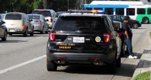 Santa Clarita Sheriff's vehicle pulled over on the westbound side of Magic Mountain Parkway in Valencia