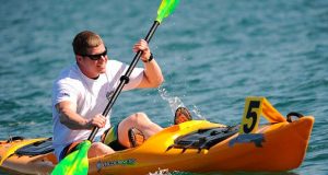 Man kayaking on the water