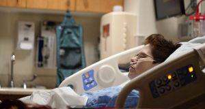 Woman in Hospital Bed