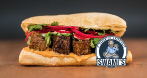 Swami's Sandwiches beef sandwich with cilantro and onion with logo in bottom-right corner