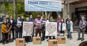 Santa Clarita City Council with Henry Mayo Staff, under a "Thank You" banner.