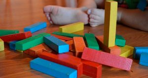 Toddler with building blocks