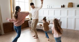 Family Dancing in Living Room