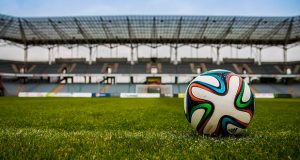 Soccer Ball on field in a stadium