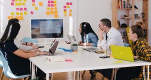 Students learning on laptops