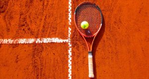 Tennis Racket on Clay