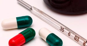 Thermometer and pills