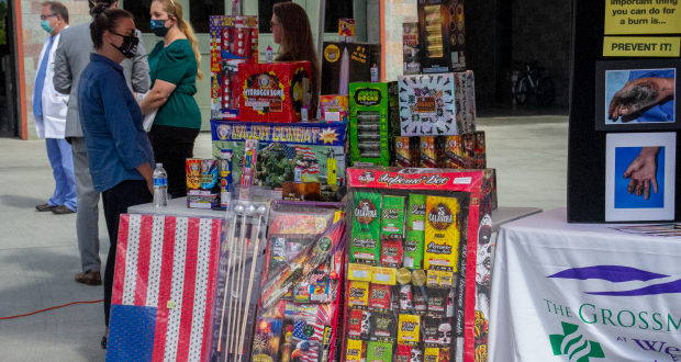 A display covering a table of fireworks and other contraband usually used around July 4th.