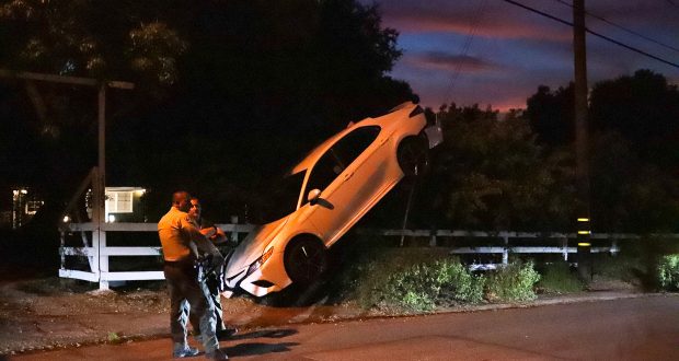 Single Car Collision Results In Vehicle Suspended In Mid-Air, No Injuries Reported