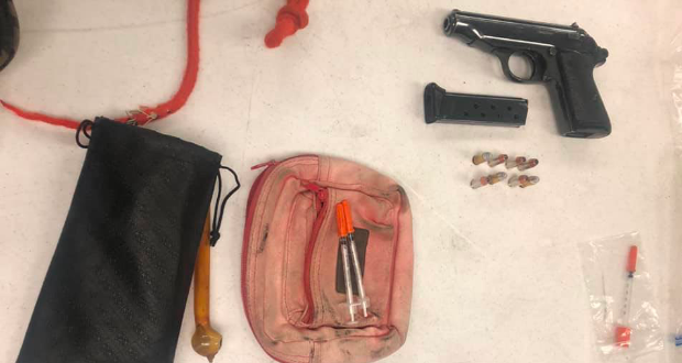 Narcotics and a firearm retrieved by COBRA detectives.