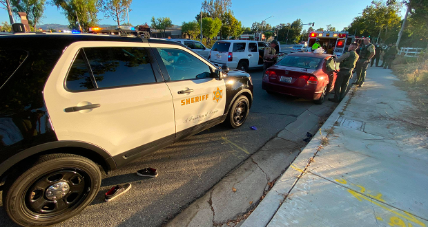 Mutliple Sheriff patrol vehicle parked around a civillian vehicle on McBean Parkway.