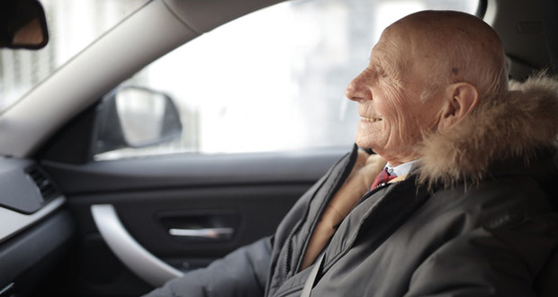 Elderly Man in Car