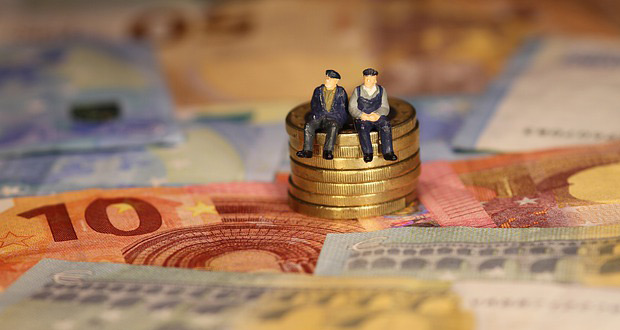 Seniors sitting on coins