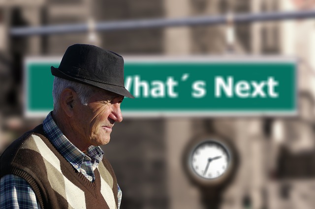 Man near street sign
