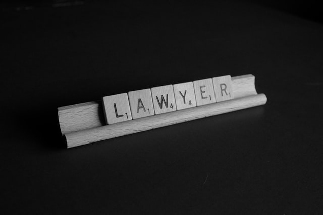 Lawyer spelled in Scrabble tiles