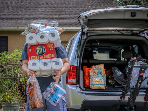 Man loading groceries into his car