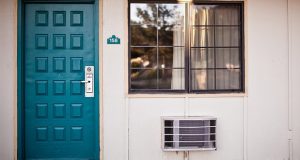 Door with AC beside it