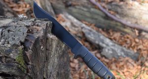 Knife stuck in log