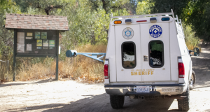 A Sheriff's Search and Rescue vehicle headed up the Rice Canyon trailhead.