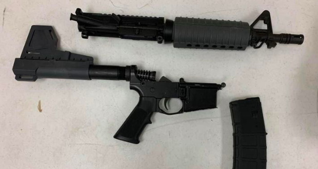 A dissassembled AR-15.