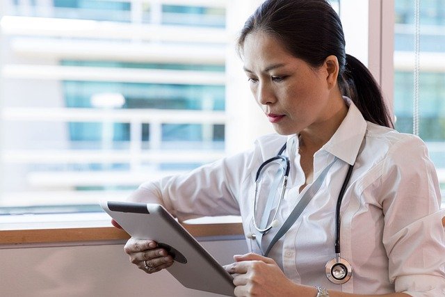 doctor with ipad