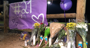 Flowers left in front of a banner with Pedro's jersey number.