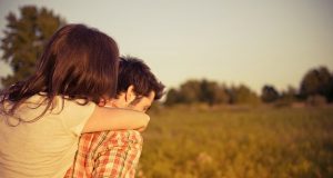Man and woman in field
