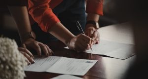 Signing papers