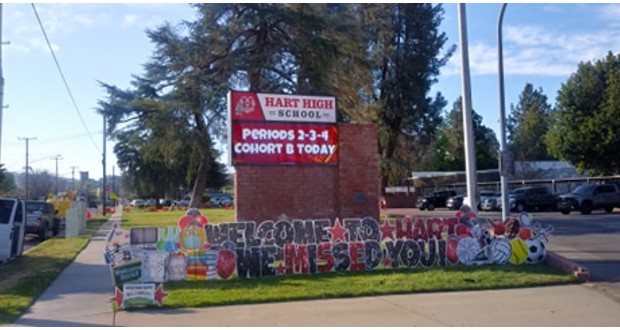 Hart High School sign with baloons and welcome back sign