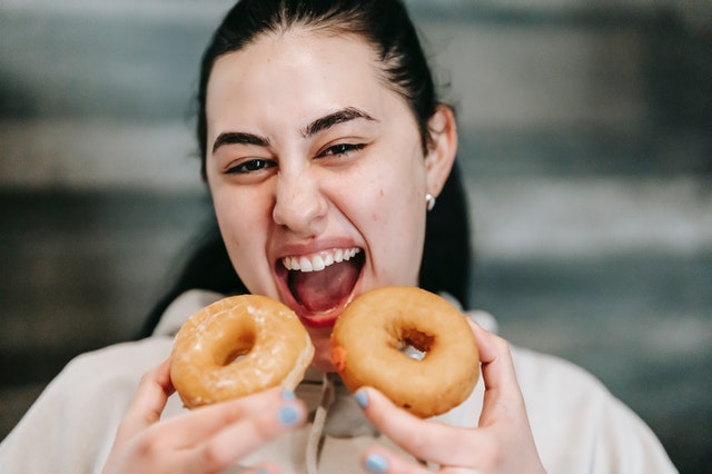 woman with donuts
