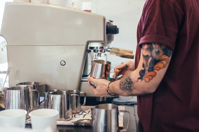 Barista making coffee