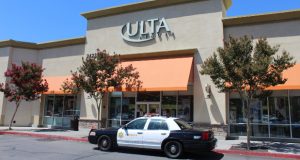 A sherriff's vehicle is parked in front of Ulta Beauty in Valencia
