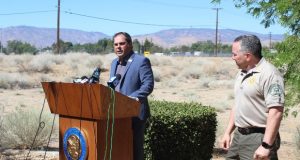 Garcia speaks at podium as Villanueva looks on