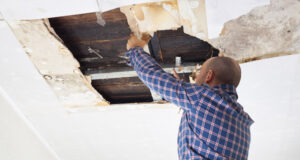 Man repairing Ceiling
